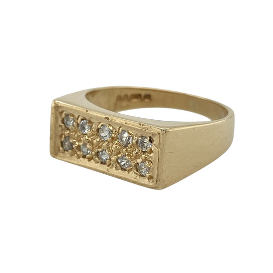 Make a bold impression with this pre-owned 9ct yellow gold multi cubic zirconia set rectangle signet ring—an eye-catching statement piece with classic structure and modern sparkle.

Design: The rectangular signet-style head measures approximately 8mm high and is adorned with multiple cubic zirconia stones, creating a bright, diamond-look finish with impressive brilliance. The clean geometric shape gives the ring a strong, contemporary edge while maintaining traditional signet appeal.