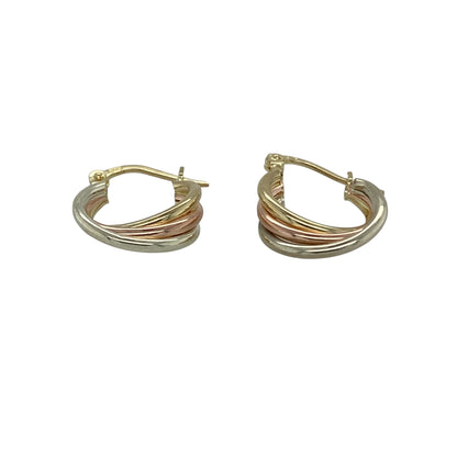 Add a beautiful blend of colour to your jewellery collection with these pre-owned 9ct yellow, rose and white gold twist hoop creole earrings—an elegant tri-colour design perfect for everyday wear.

Design: The classic hoop creole shape is enhanced with an intertwined twist effect, combining three complementary gold tones for added dimension and visual interest. The flowing twist design catches the light from every angle, creating subtle sparkle and movement.