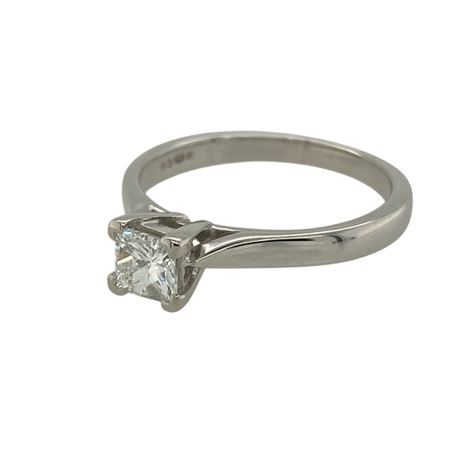 Experience refined brilliance with this pre-owned platinum and diamond set solitaire ring—an elegant and contemporary choice for engagements or meaningful milestones.

Design: The ring features a striking princess cut diamond weighing approximately 0.39ct, offering crisp facets and exceptional sparkle. The clean solitaire setting showcases the geometric beauty of the square-cut stone, creating a modern yet timeless silhouette.