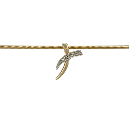 Celebrate love and elegance with this pre-owned 9ct yellow gold diamond set kiss pendant on a 16" snake chain necklace—an eye-catching piece perfect for everyday wear or a meaningful gift.

Design: The pendant features a graceful “kiss” design measuring approximately 1.2cm long, accented with sparkling diamonds that add refined brilliance. The flowing curves create a soft, romantic silhouette that sits beautifully at the neckline.