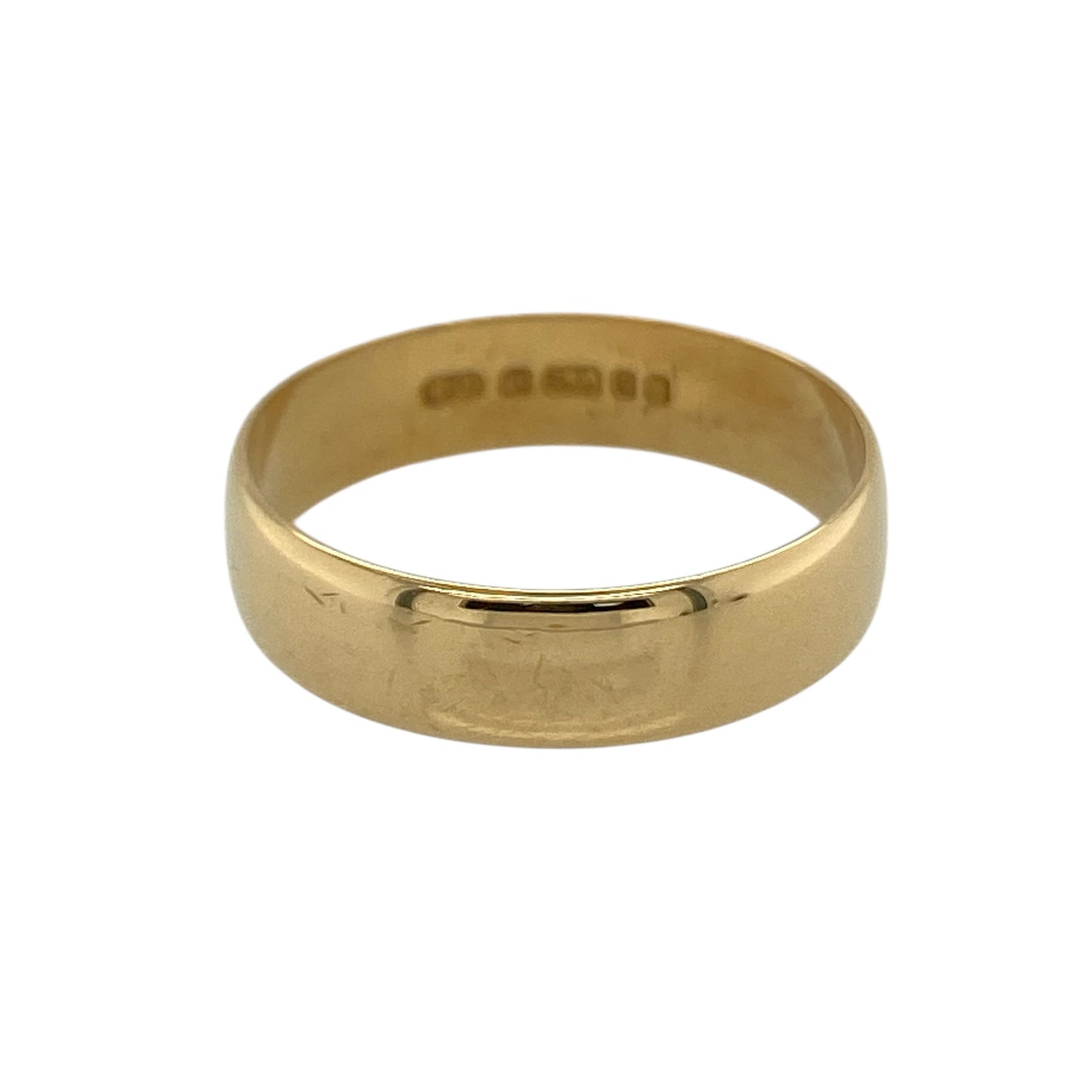 Mark your commitment with timeless elegance in this pre-owned 18ct yellow gold 5mm wedding band ring—an enduring and classic choice for everyday wear.

Design: The band measures approximately 5mm wide, offering a balanced and traditional profile that sits comfortably on the finger. Its smooth, plain finish creates a clean and refined look suited to both modern and classic tastes.