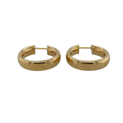 Add bold pattern and timeless heritage styling to your jewellery collection with these pre-owned 14ct yellow gold Greek key hoop creole earrings—an eye-catching pair perfect for everyday wear or special occasions.

Design: The classic hoop creole silhouette is enhanced with a striking Greek key pattern, symbolising infinity and unity. The detailed motif adds texture and visual depth, giving the earrings a distinctive and sophisticated finish.