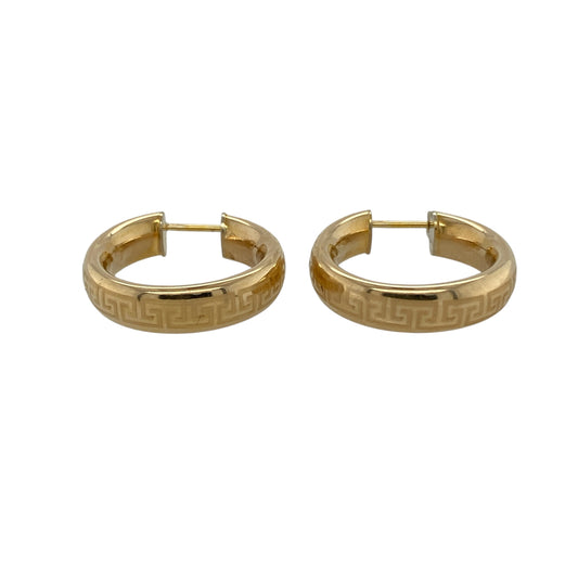 Add bold pattern and timeless heritage styling to your jewellery collection with these pre-owned 14ct yellow gold Greek key hoop creole earrings—an eye-catching pair perfect for everyday wear or special occasions.

Design: The classic hoop creole silhouette is enhanced with a striking Greek key pattern, symbolising infinity and unity. The detailed motif adds texture and visual depth, giving the earrings a distinctive and sophisticated finish.