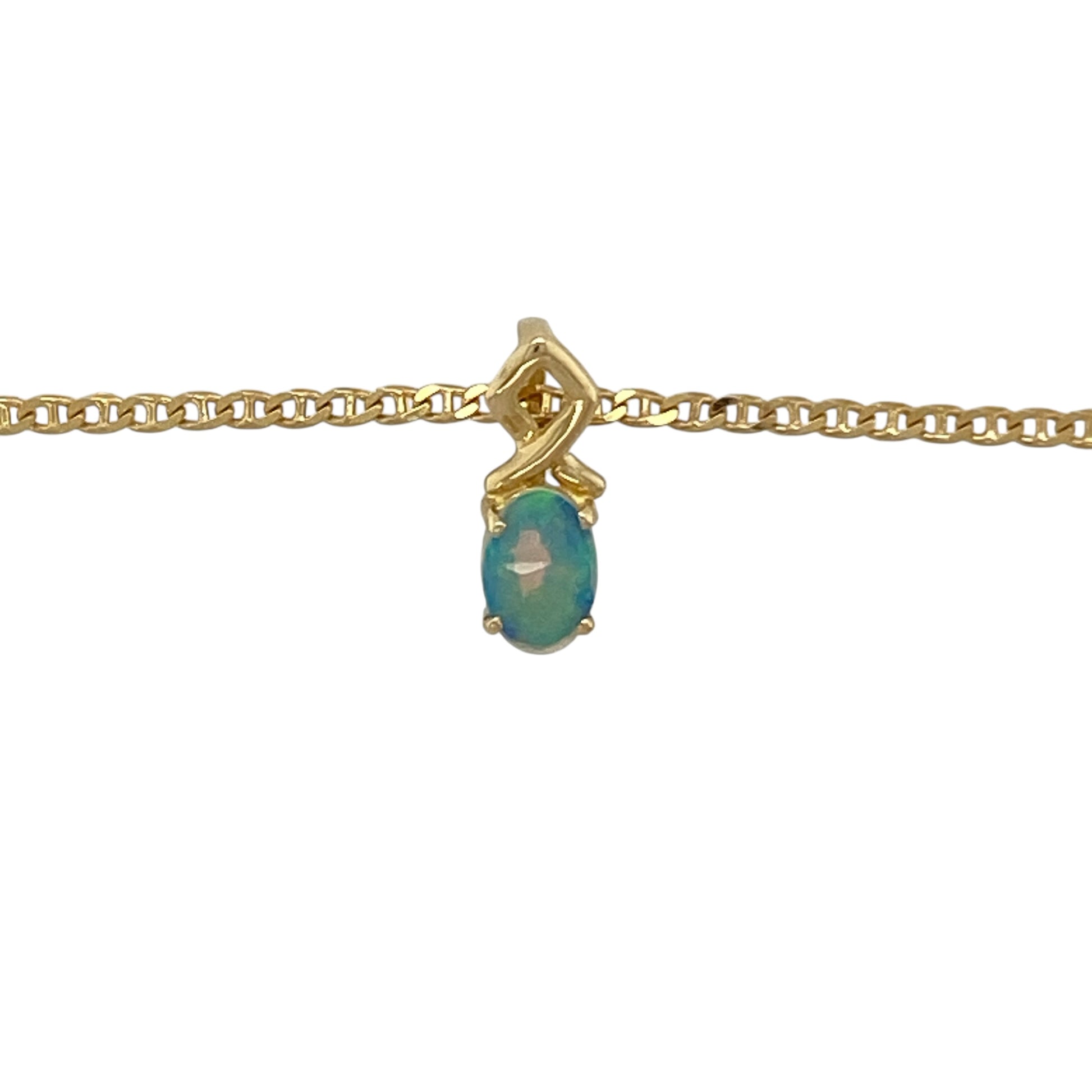 Add a soft shimmer of colour to your jewellery collection with this pre-owned 18ct yellow gold opalique style pendant on a 16" anchor chain necklace—an elegant piece perfect for everyday wear or subtle occasion styling.

Design: The pendant measures approximately 1.2cm long including the bail and features a beautiful oval opalique style stone measuring around 6mm by 4mm. The stone displays a gentle iridescent glow, creating a delicate and eye-catching focal point.