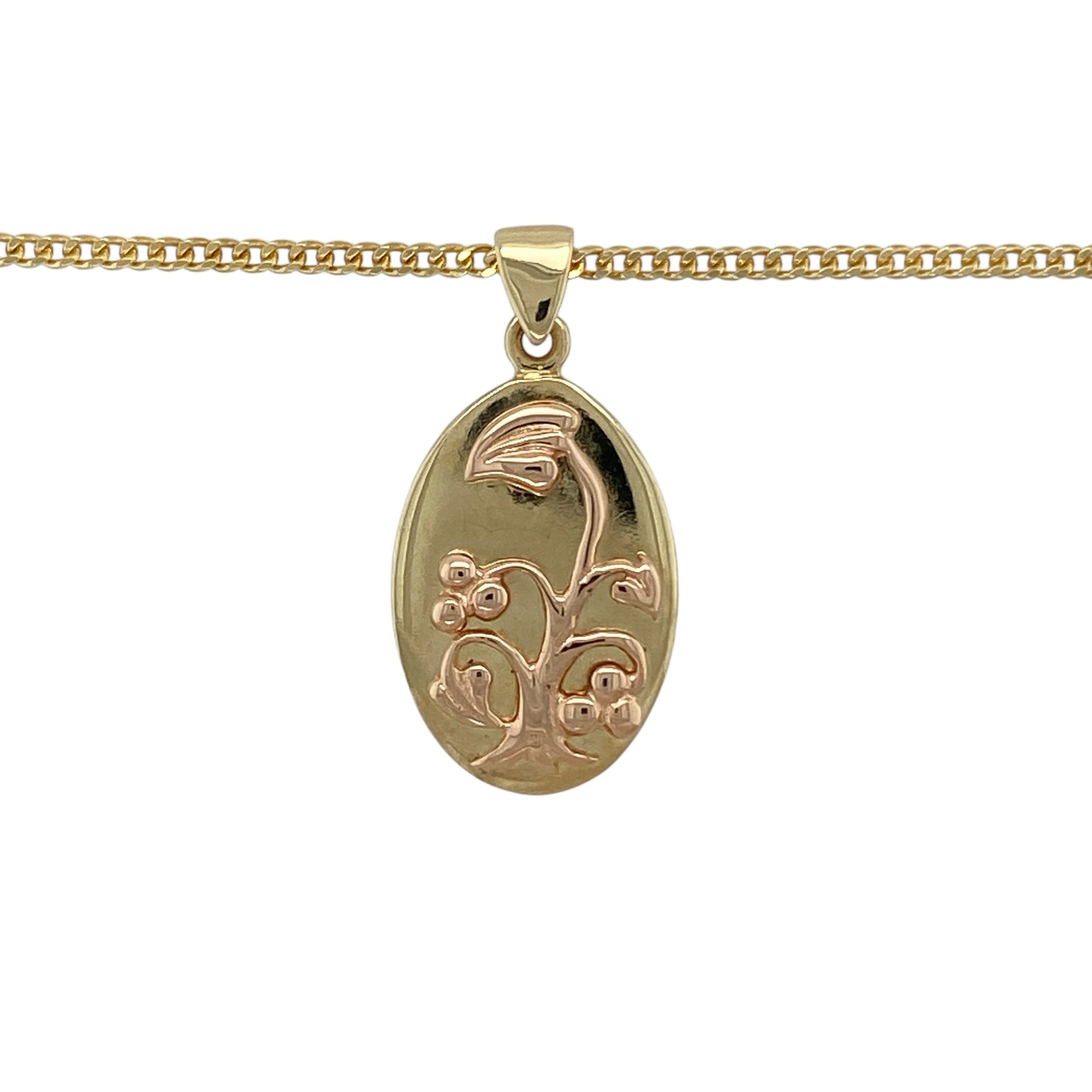 Celebrate Welsh heritage and meaningful symbolism with this pre-owned 9ct yellow and rose gold Cymru metal Tree of Life oval pendant on a 20" curb chain necklace—an elegant and distinctive piece with timeless appeal.

Design: The oval pendant measures approximately 2.9cm long including the bail and features the iconic Tree of Life motif, symbolising growth, strength and family. The rose gold Tree of Life design contrasts beautifully against the yellow gold oval frame, creating depth and eye-catching detail.