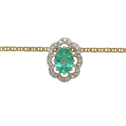 Add vibrant colour and timeless elegance to your jewellery collection with this pre-owned 18ct yellow gold diamond and emerald coloured stone set cluster pendant on an 18" anchor chain necklace—an eye-catching piece perfect for special occasions or refined everyday wear.

Design: The pendant measures approximately 1.5cm long and features a striking 8mm by 6mm oval emerald coloured stone at its centre.