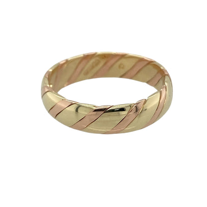 Bring warmth, elegance, and heritage-inspired design to your collection with this pre-owned 9ct yellow and rose gold Clogau twisted band ring—a refined piece that beautifully symbolises unity and connection.

Design: The ring features a graceful twisted band design, intertwining yellow and rose gold strands to create a flowing, organic pattern that reflects Clogau’s signature style and Welsh craftsmanship.