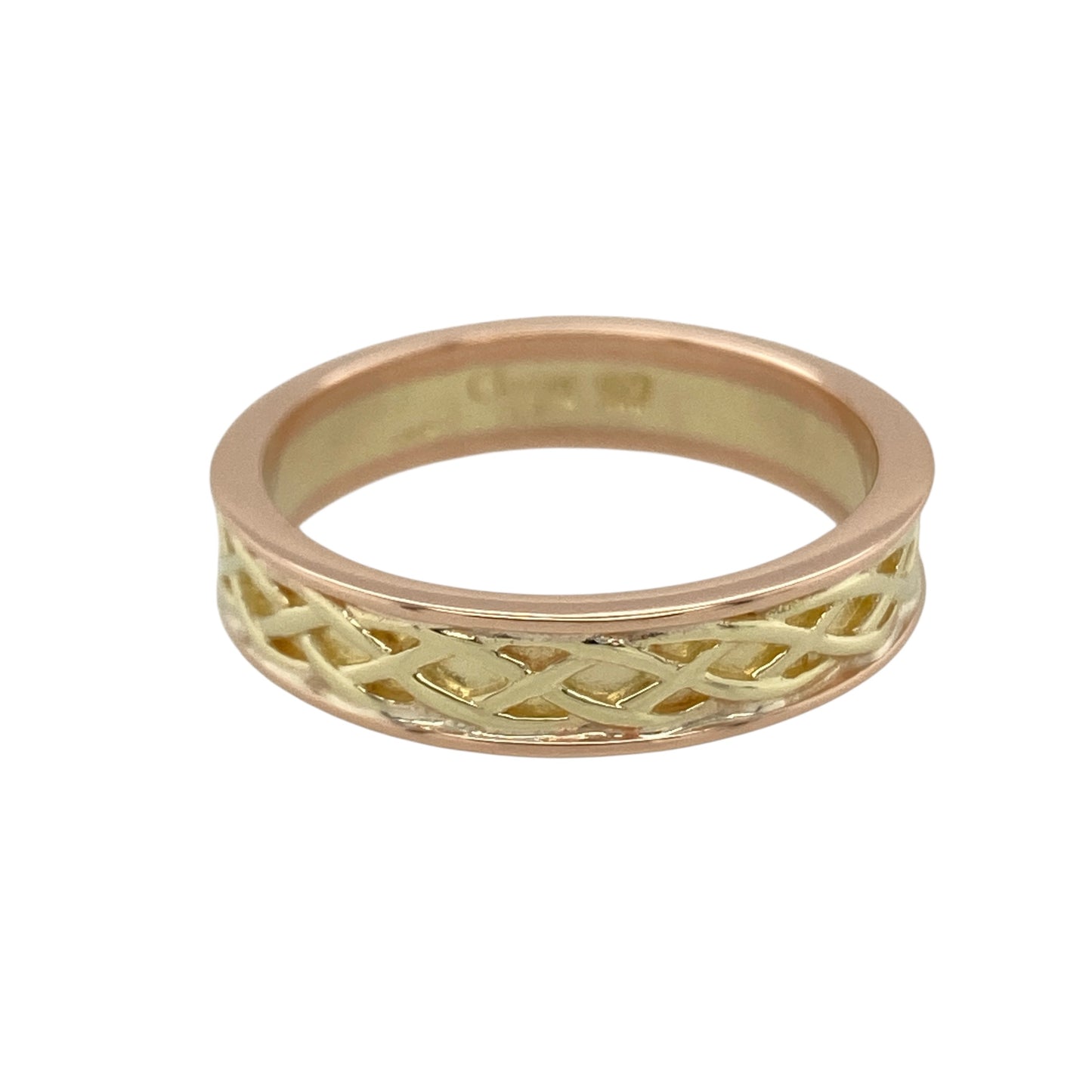 Celebrate heritage and timeless design with this pre-owned 9ct yellow and rose gold Clogau Celtic weave band ring—an elegant and meaningful piece perfect for everyday wear.

Design: The band measures approximately 5mm wide and features an intricate Celtic weave pattern flowing around the ring. The detailed design symbolises eternity and interconnectedness, creating a bold yet refined profile on the hand.