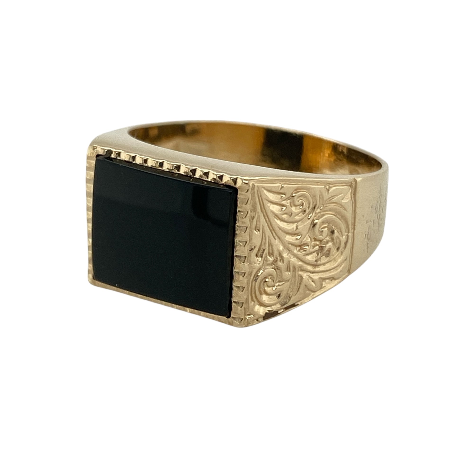 Add bold classic style to your jewellery collection with this pre-owned 9ct yellow gold onyx signet ring, featuring a striking black gemstone and traditional rectangular design—perfect as a statement ring or timeless everyday piece.

Design: The ring features a polished rectangular onyx measuring approximately 12mm by 9mm, creating a strong and sophisticated focal point. The deep black stone contrasts beautifully with the gold, while the patterned shoulders add decorative detail and vintage character.