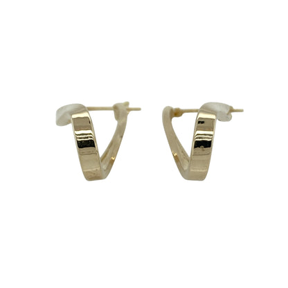 Add classic elegance with a touch of texture to your jewellery collection with these pre-owned 9ct yellow gold twist oval creole earrings, offering a timeless hoop style with subtle detail—perfect for everyday wear.

Design: The earrings feature an elegant oval creole shape with a delicate twisted pattern running along the front, creating texture and light-catching detail. The twist design adds depth and visual interest while maintaining a classic hoop silhouette.