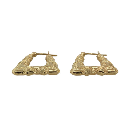 Add a playful and stylish touch to your jewellery collection with these pre-owned 9ct yellow gold patterned handbag creole earrings, featuring a distinctive novelty design—perfect for everyday wear or as a unique gift.

Design: The earrings are shaped in a charming handbag silhouette with decorative patterned detailing across the surface, creating texture and visual interest. The creole style adds gentle movement while highlighting the fun and fashionable design.
