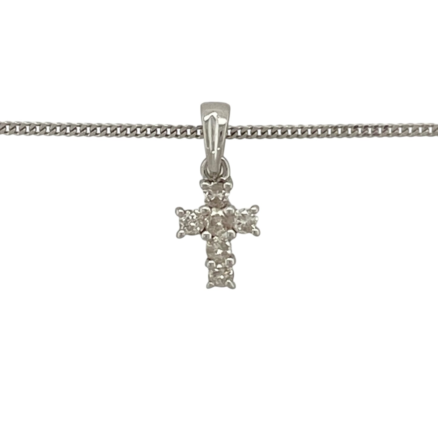 Add delicate sparkle and meaningful symbolism to your jewellery collection with this pre-owned 9ct white gold diamond set cross pendant necklace, featuring a timeless and elegant design—perfect for everyday wear or as a thoughtful gift.

Design: The pendant is styled as a classic cross and is accented with small sparkling diamonds, creating a refined and elegant look. Measuring approximately 1.4cm in length including the bail, the pendant offers a subtle yet noticeable presence.