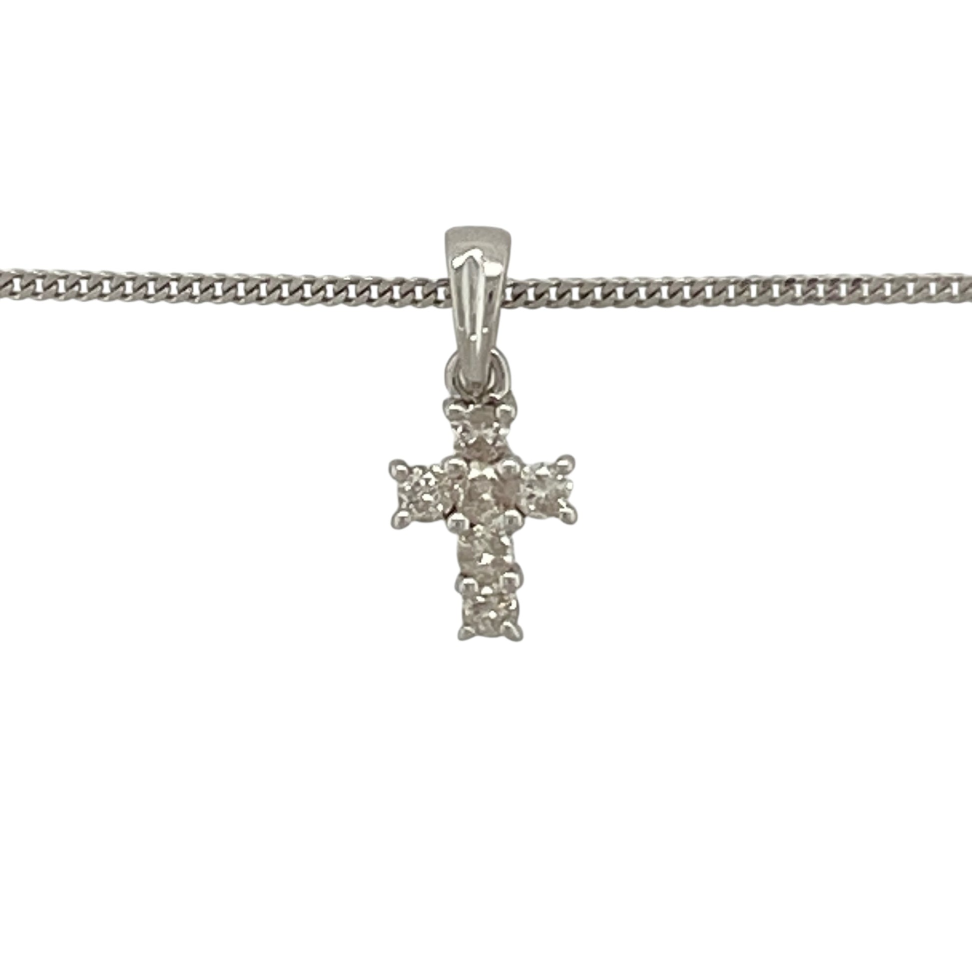 Add delicate sparkle and meaningful symbolism to your jewellery collection with this pre-owned 9ct white gold diamond set cross pendant necklace, featuring a timeless and elegant design—perfect for everyday wear or as a thoughtful gift.

Design: The pendant is styled as a classic cross and is accented with small sparkling diamonds, creating a refined and elegant look. Measuring approximately 1.4cm in length including the bail, the pendant offers a subtle yet noticeable presence.