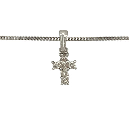 Add delicate sparkle and meaningful symbolism to your jewellery collection with this pre-owned 9ct white gold diamond set cross pendant necklace, featuring a timeless and elegant design—perfect for everyday wear or as a thoughtful gift.

Design: The pendant is styled as a classic cross and is accented with small sparkling diamonds, creating a refined and elegant look. Measuring approximately 1.4cm in length including the bail, the pendant offers a subtle yet noticeable presence.