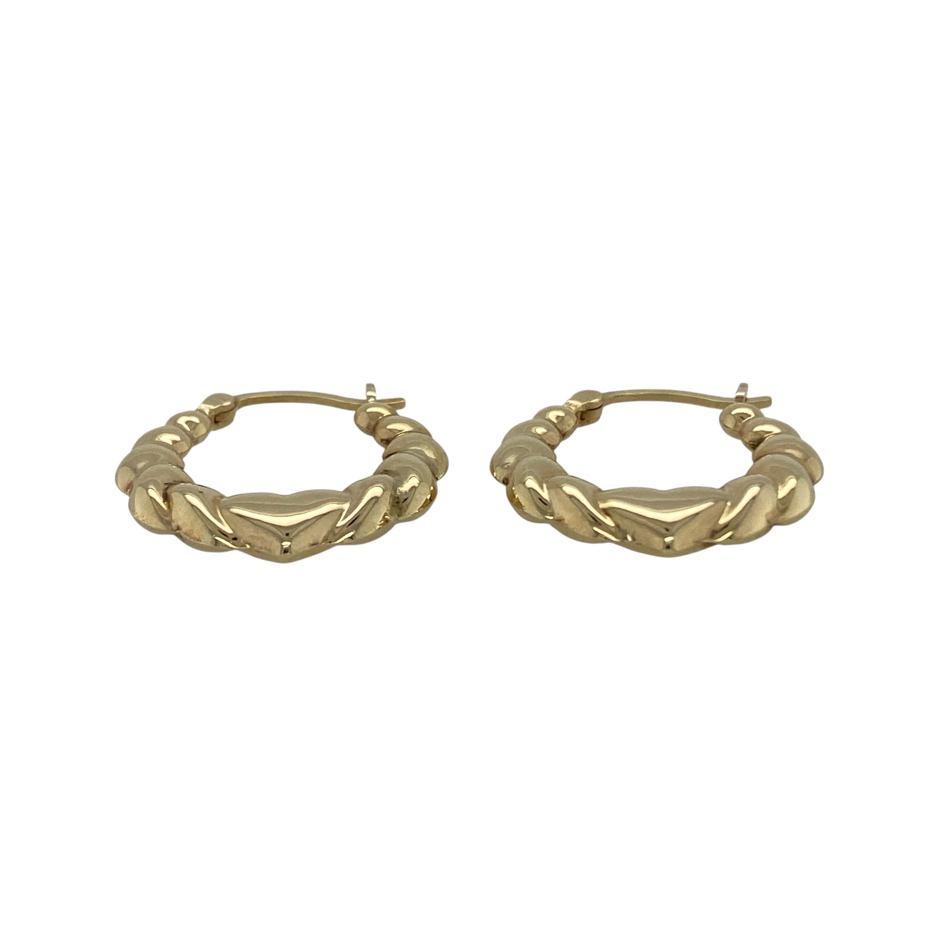 Add playful charm and timeless gold style to your jewellery collection with these pre-owned 9ct yellow gold heart bubble style oval creole earrings, featuring a distinctive textured design—perfect for everyday wear.

Design: The earrings feature an elegant oval creole shape decorated with raised heart bubble detailing across the surface. The textured pattern adds dimension and light-catching shine while giving the earrings a fun and feminine look.