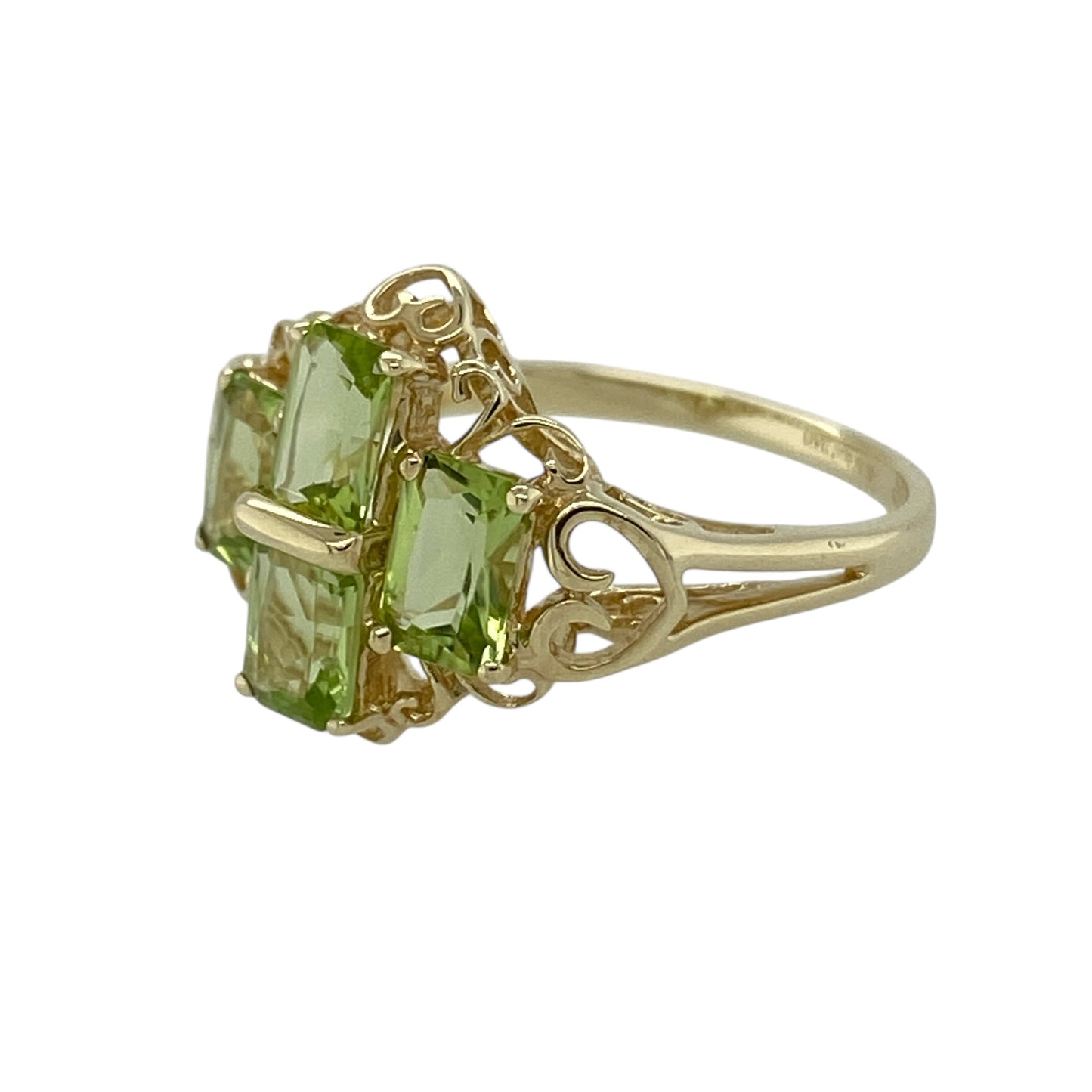 Add vibrant colour and elegant sparkle to your jewellery collection with this pre-owned 9ct yellow gold peridot cluster dress ring, featuring bright gemstones and a bold design—perfect as a statement piece or August birthstone ring.

Design: The ring showcases a cluster of rectangular peridot stones, each measuring approximately 6mm by 4mm, arranged to create a striking and eye-catching display. The vivid green tones of the peridot give the ring a fresh and lively appearance.