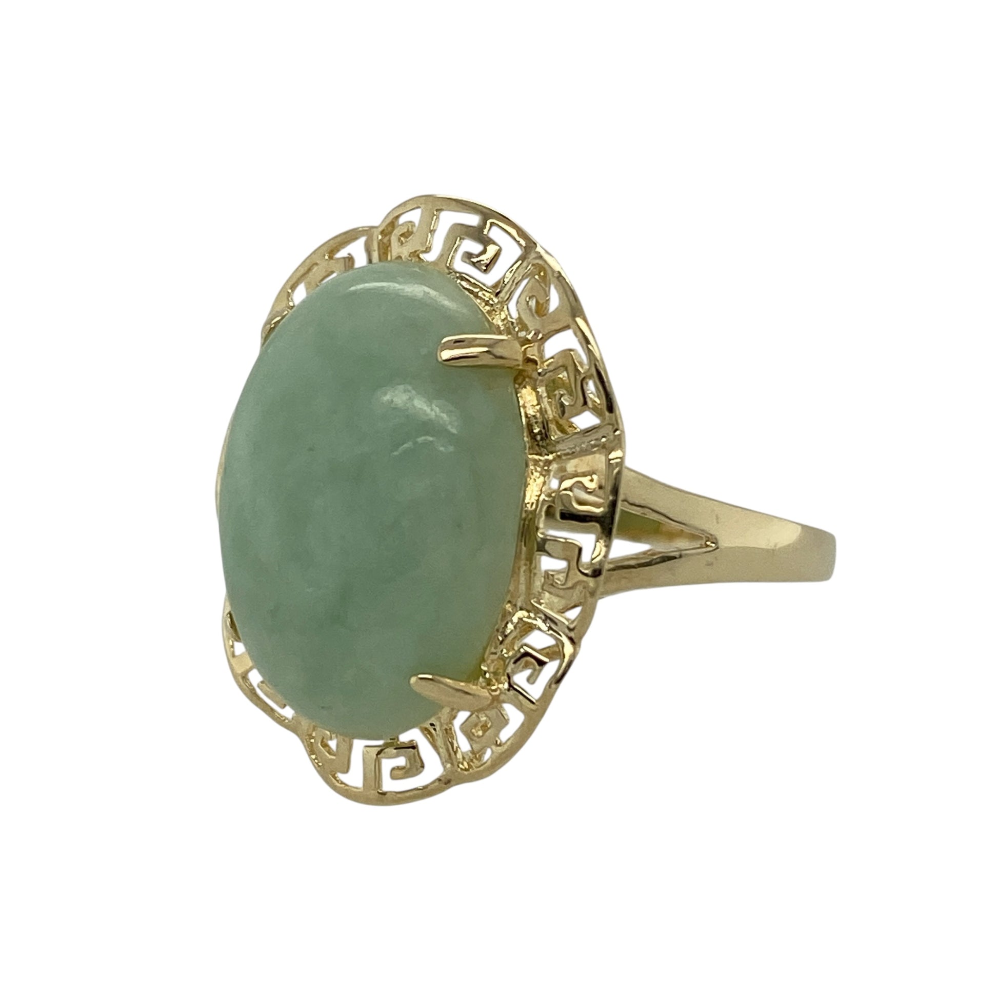 Add bold vintage-inspired style to your jewellery collection with this pre-owned 9ct yellow gold jade Greek key ring, featuring a striking gemstone and decorative surround—perfect as a statement piece or distinctive dress ring.

Design: The ring showcases a large oval jade measuring approximately 17mm by 13mm, creating a strong and eye-catching focal point. The gemstone is framed by an intricate Greek key style surround, adding a classic decorative border that enhances the overall design.