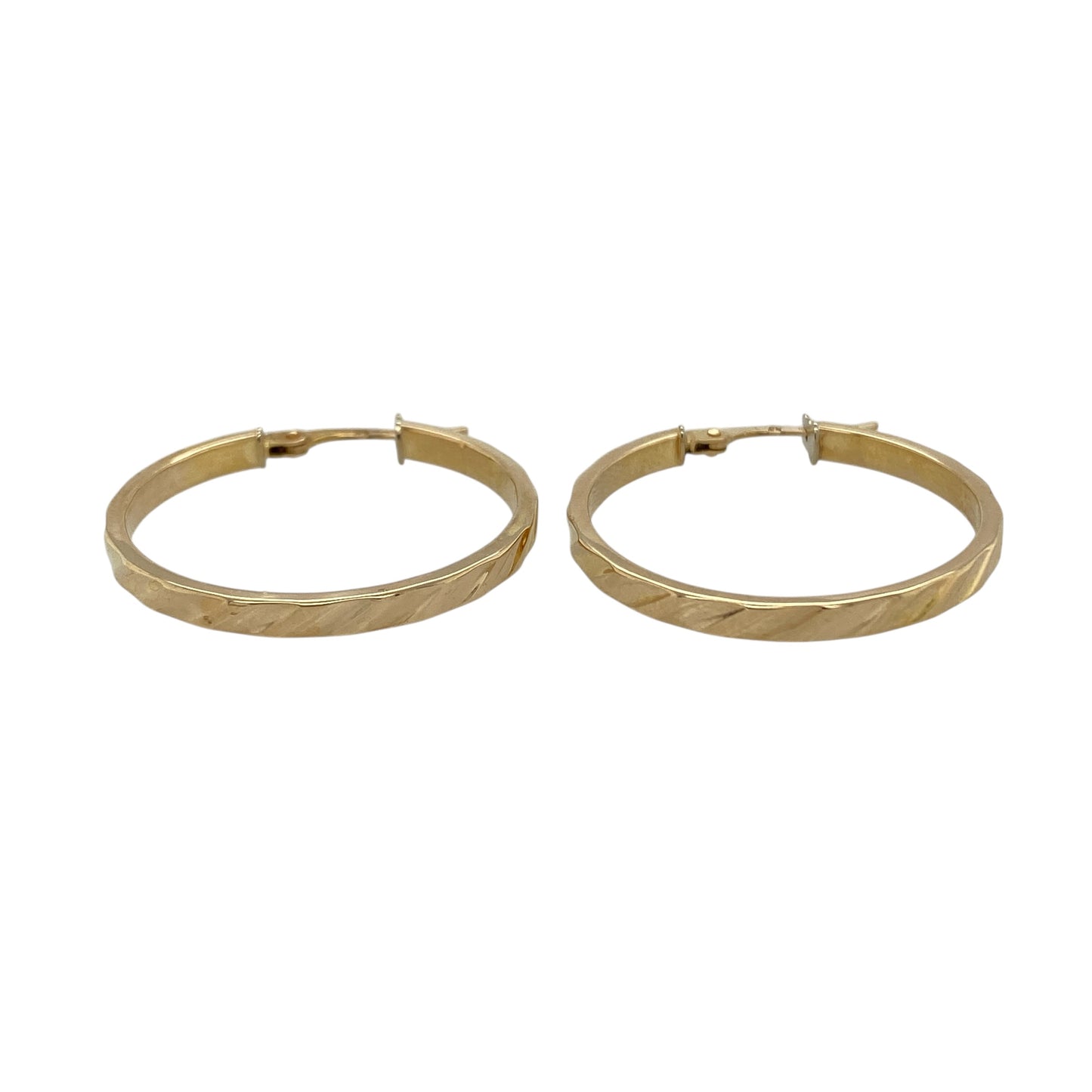 Add classic texture and timeless style to your jewellery collection with these pre-owned 9ct yellow gold stripe patterned hoop creole earrings, featuring a decorative finish—perfect for everyday wear or special occasions.

Design: The earrings feature a traditional hoop creole shape with fine striped detailing across the surface, creating a subtle textured effect that catches the light beautifully.