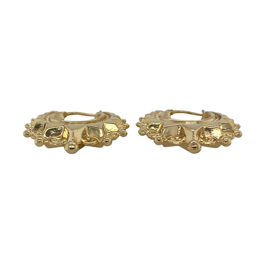 Add vintage-inspired elegance to your jewellery collection with these pre-owned 9ct yellow gold Victorian style fancy creole hoop earrings, featuring intricate detailing and classic gold styling—perfect for special occasions or stylish everyday wear.

Design: The earrings showcase an ornate Victorian style design with decorative patterns across the creole hoops, creating a distinctive and eye-catching look. The intricate detailing gives the earrings a beautiful antique-inspired appearance.