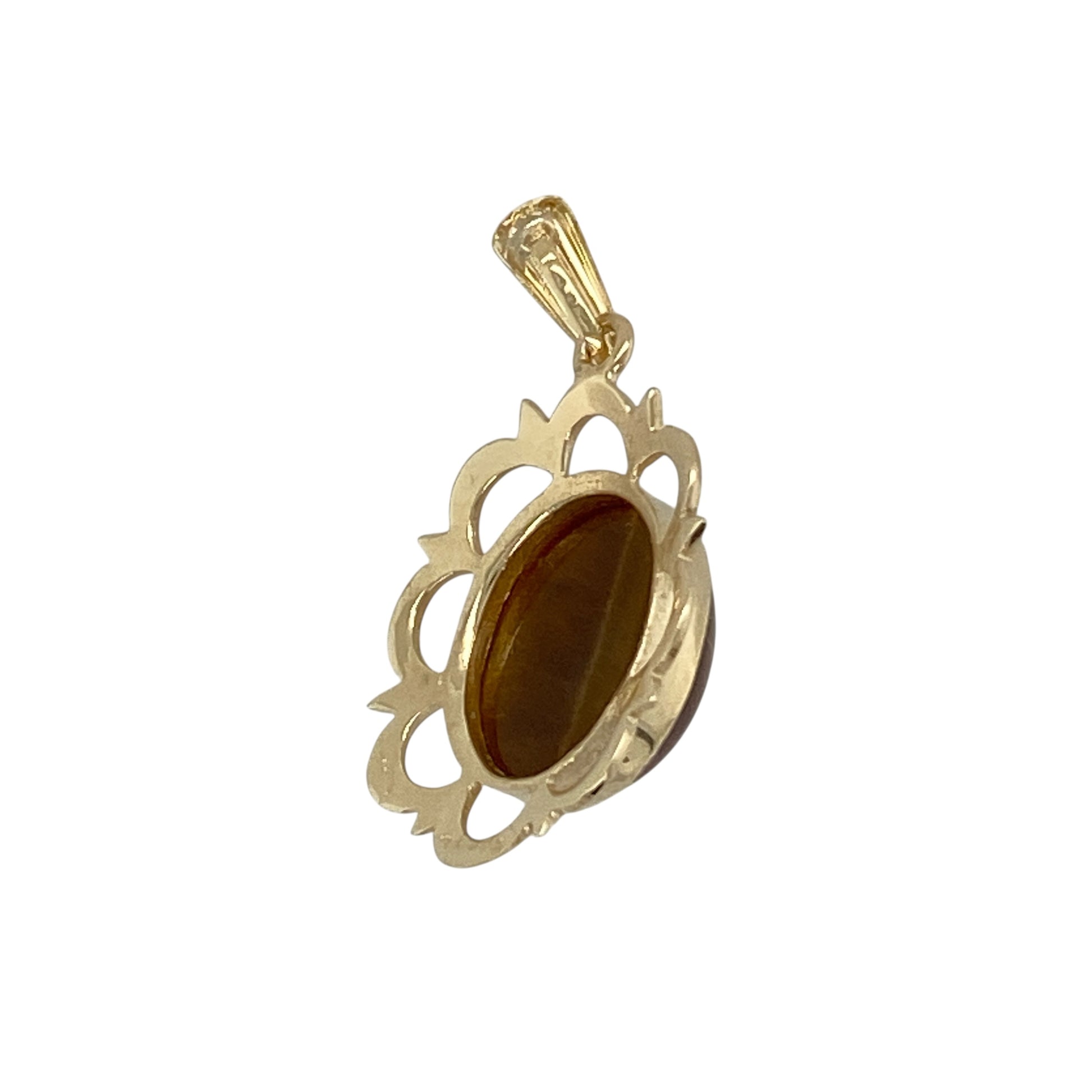Add warm natural tones and classic style to your jewellery collection with this pre-owned 9ct yellow gold tiger’s eye oval pendant, featuring a striking gemstone and elegant open surround design—perfect for everyday wear or a distinctive gift.

Design: The pendant showcases a polished oval tiger’s eye stone measuring approximately 12mm by 10mm, displayed within an open gold surround that highlights the stone’s rich golden-brown bands and natural chatoyancy.