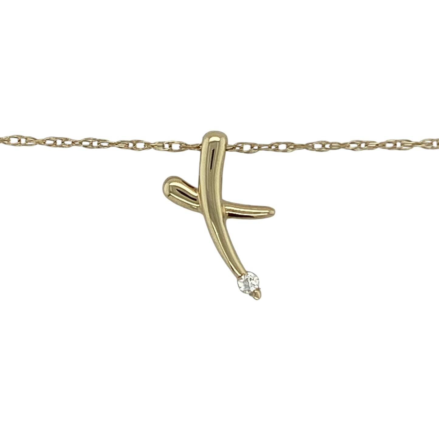 Add a touch of sparkle and modern style to your jewellery collection with this pre-owned 9ct yellow gold cubic zirconia X shape kiss pendant necklace, featuring a sleek and elegant design—perfect for everyday wear or a thoughtful gift.

Design: The pendant is styled in an X shape, often known as a kiss design, and is accented with sparkling cubic zirconia stones for added brilliance. Measuring approximately 1.6cm in length, the pendant offers a delicate yet eye-catching appearance.