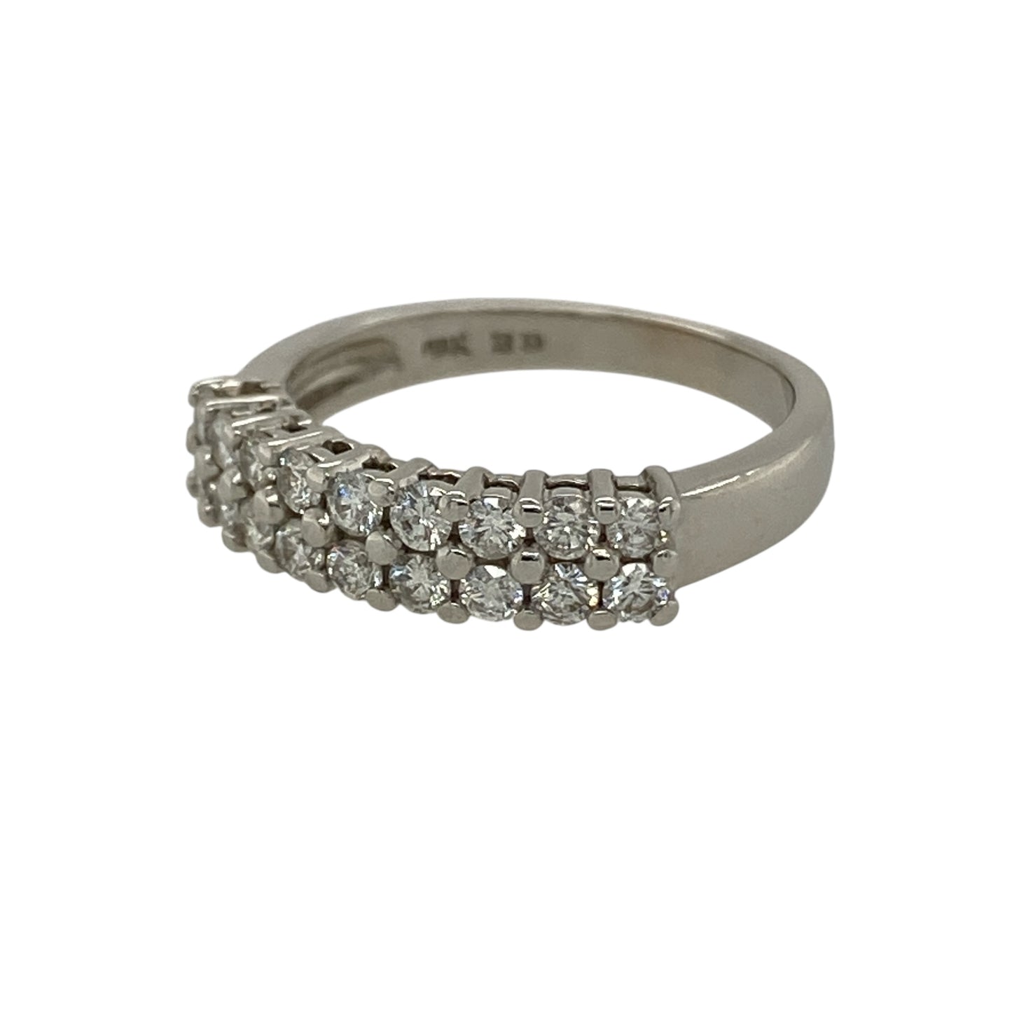 Add elegant sparkle and timeless style to your jewellery collection with this pre-owned 9ct white gold diamond two row band ring, featuring a striking display of brilliance—perfect as a statement ring or sophisticated everyday piece.

Design: The front of the band measures approximately 5mm wide and features two rows of sparkling diamonds arranged across the surface. With approximately 0.60ct total diamond content, the stones create a bright and eye-catching display of light and brilliance.