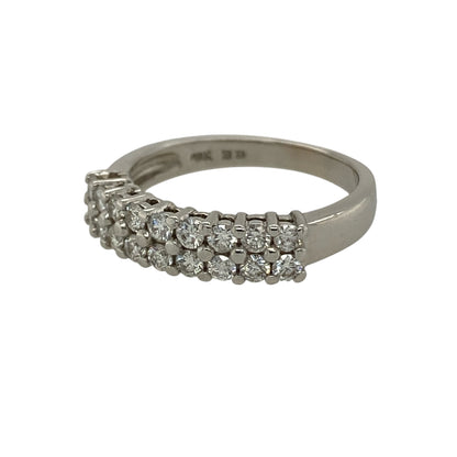 Add elegant sparkle and timeless style to your jewellery collection with this pre-owned 9ct white gold diamond two row band ring, featuring a striking display of brilliance—perfect as a statement ring or sophisticated everyday piece.

Design: The front of the band measures approximately 5mm wide and features two rows of sparkling diamonds arranged across the surface. With approximately 0.60ct total diamond content, the stones create a bright and eye-catching display of light and brilliance.