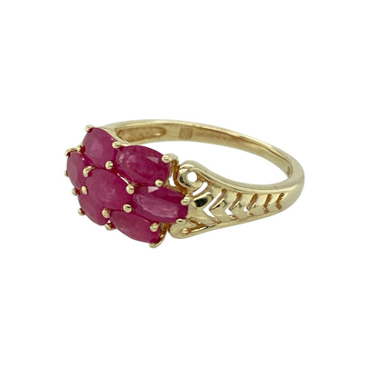 Add rich colour and timeless elegance to your jewellery collection with this pre-owned 9ct yellow gold ruby cluster ring, featuring a classic gemstone arrangement—perfect for everyday wear or as a striking dress ring.

Design: The ring showcases a cluster of oval rubies, each measuring approximately 5mm by 3mm, arranged to create a vibrant and eye-catching display across the finger. The cluster formation enhances the deep red colour of the stones for a bold yet elegant appearance.
