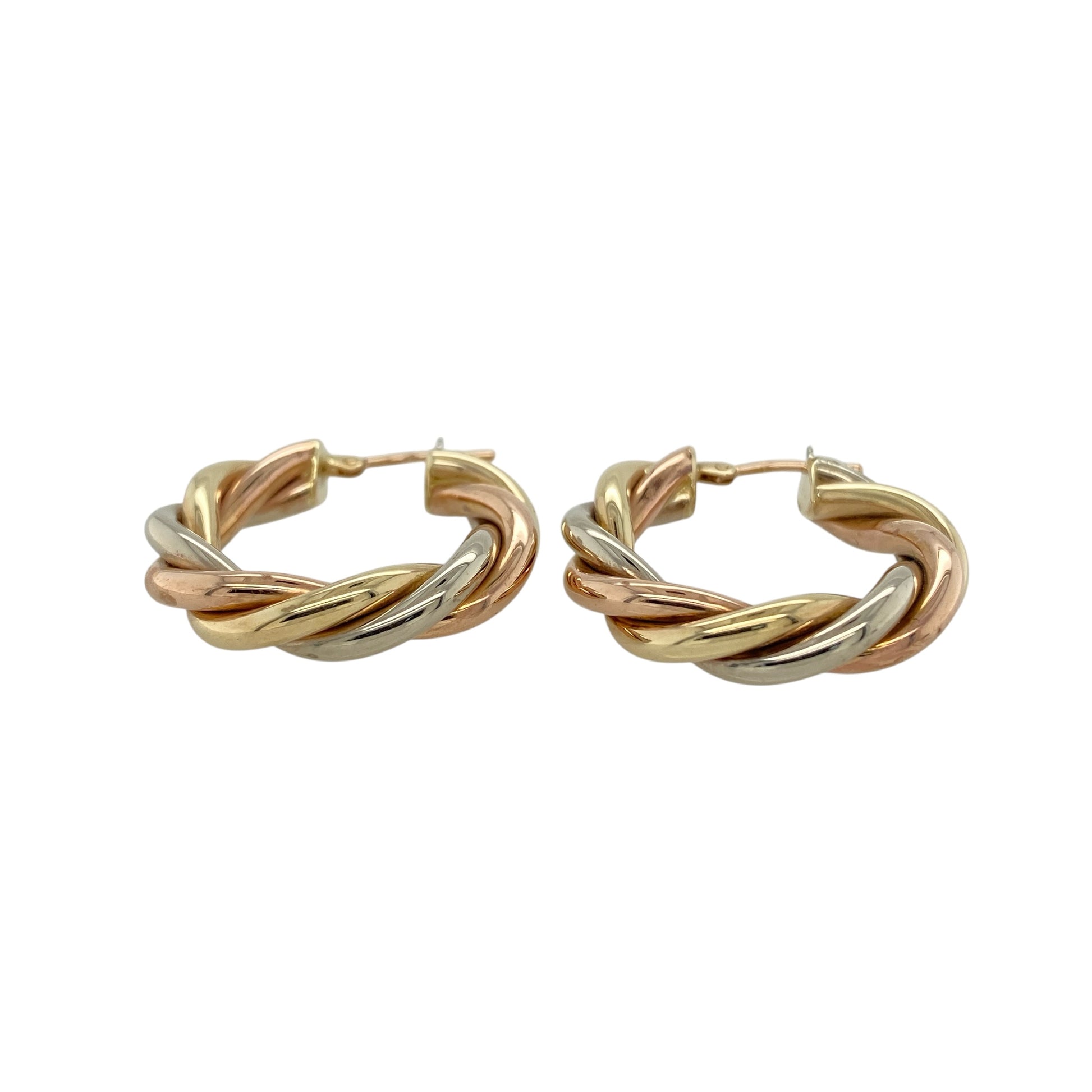 Add bold elegance and versatile style to your jewellery collection with these pre-owned yellow, rose and white gold twist hoop creole earrings, featuring a striking three-colour design—perfect for everyday wear or special occasions.

Design: The earrings feature a twisted hoop creole design combining yellow, rose and white gold strands. The flowing twist pattern creates beautiful movement and contrast between the three gold tones, giving the earrings a distinctive and eye-catching appearance.
