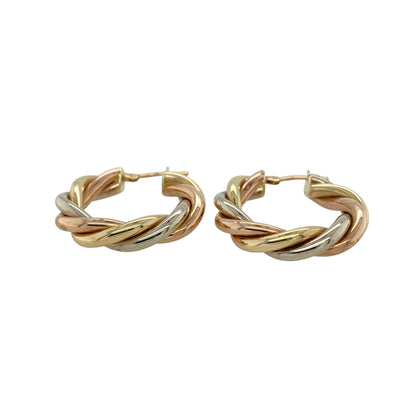 Add bold elegance and versatile style to your jewellery collection with these pre-owned yellow, rose and white gold twist hoop creole earrings, featuring a striking three-colour design—perfect for everyday wear or special occasions.

Design: The earrings feature a twisted hoop creole design combining yellow, rose and white gold strands. The flowing twist pattern creates beautiful movement and contrast between the three gold tones, giving the earrings a distinctive and eye-catching appearance.
