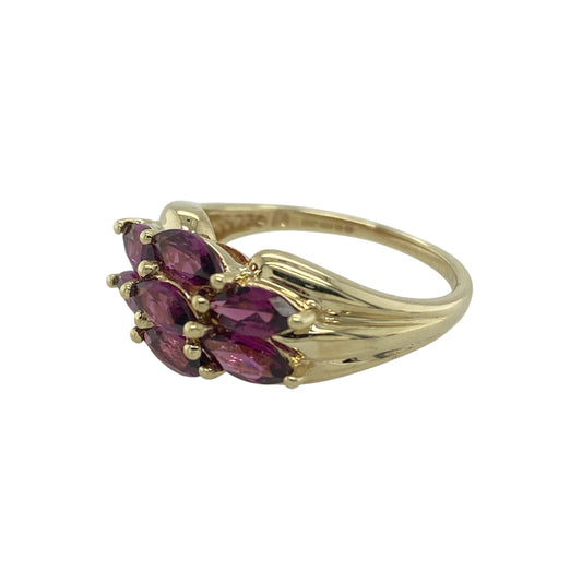Bring vibrant colour and classic sparkle to your jewellery collection with this pre-owned 9ct yellow gold purple stone cluster ring, featuring a striking cluster design that creates eye-catching brilliance—perfect for everyday wear or adding a bold statement to special occasions.

Design: The ring features a classic cluster arrangement of purple gemstones, forming a beautifully balanced focal point. 