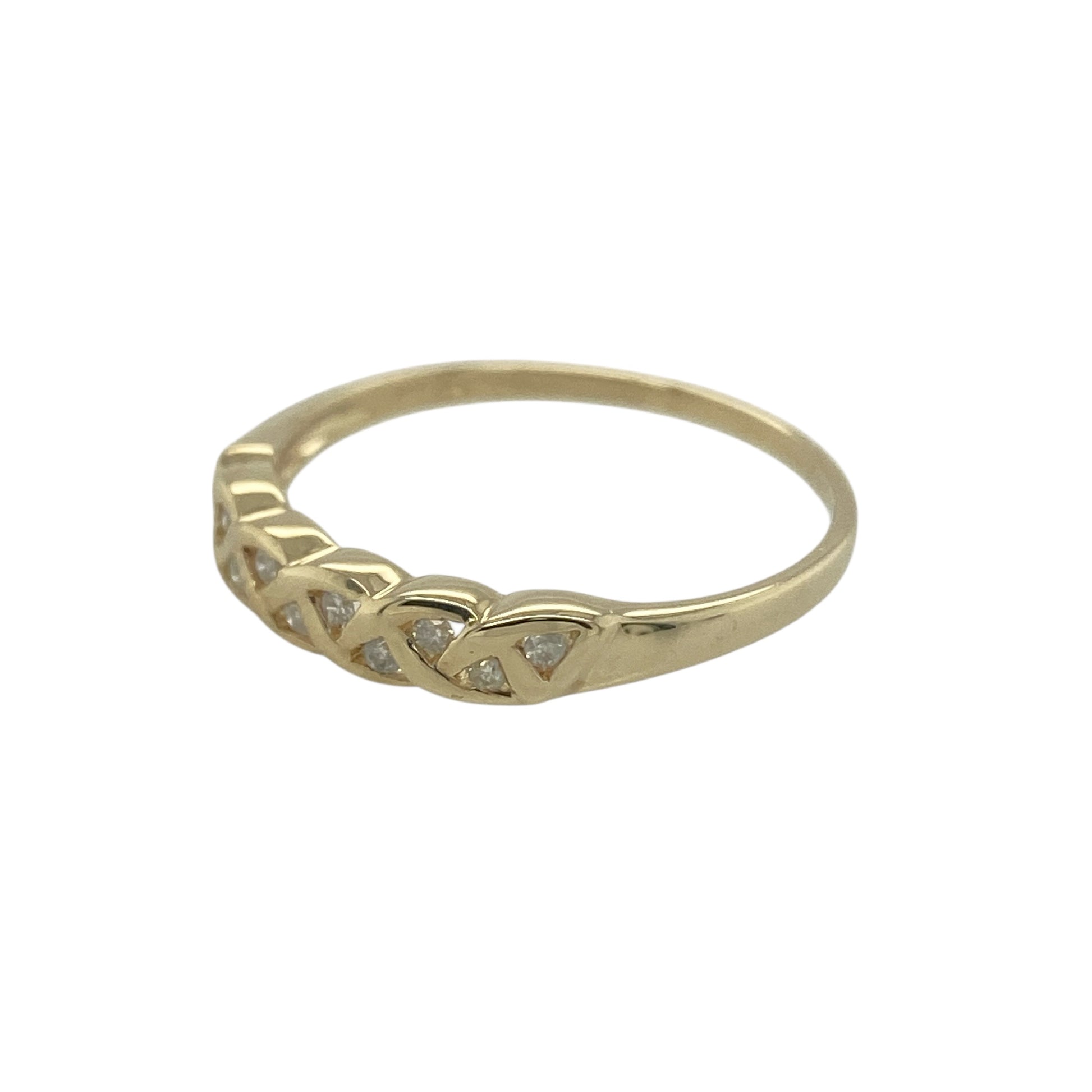 Add subtle sparkle and timeless style to your jewellery collection with this pre-owned 9ct yellow gold diamond set band ring, featuring a classic and versatile design—perfect for everyday wear or stacking with other rings.

Design: The ring features sparkling diamonds arranged along the front of the band, creating a delicate yet eye-catching display of brilliance while maintaining a simple and elegant profile.
