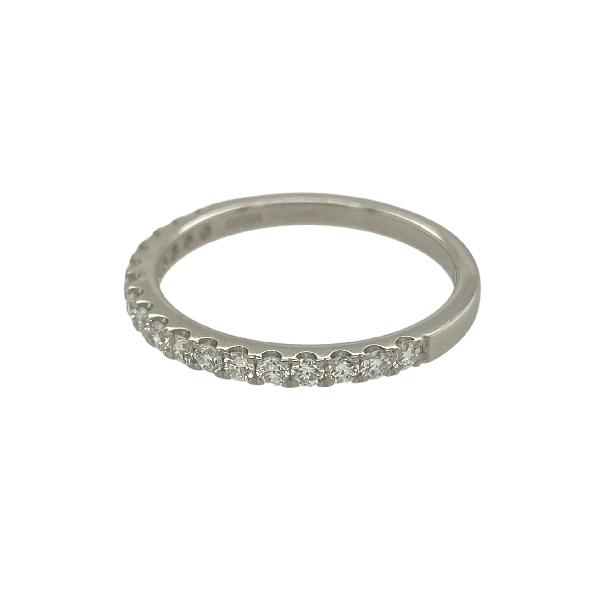 Add refined sparkle and timeless style to your jewellery collection with this pre-owned platinum diamond set band ring, featuring a classic and elegant design—perfect for everyday wear or a meaningful gift.

Design: The band is accented with sparkling diamonds arranged across the front, creating a subtle yet eye-catching display of brilliance while maintaining a clean and sophisticated profile.
