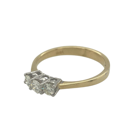 Add timeless sparkle and meaningful design to your jewellery collection with this pre-owned 18ct yellow gold diamond trilogy ring, featuring a classic three stone setting—perfect for everyday elegance or a special occasion piece.

Design: The ring showcases three sparkling diamonds arranged across the centre in a traditional trilogy formation, creating a balanced and elegant display of brilliance. With approximately 0.36ct total diamond content, the stones offer subtle yet refined sparkle.
