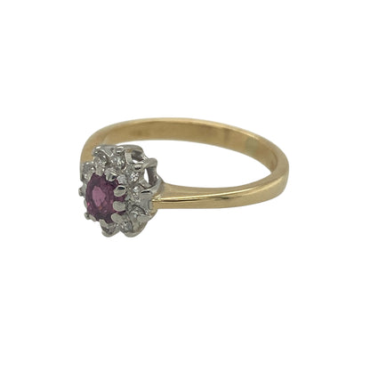 Add rich colour and timeless sparkle to your jewellery collection with this pre-owned 18ct yellow gold diamond and ruby cluster ring, featuring a classic gemstone combination—perfect for everyday elegance or a meaningful gift.

Design: The ring showcases an oval ruby at the centre measuring approximately 4mm by 3mm, surrounded by a cluster of sparkling diamonds that enhance the deep red colour and create a bright, eye-catching focal point.
