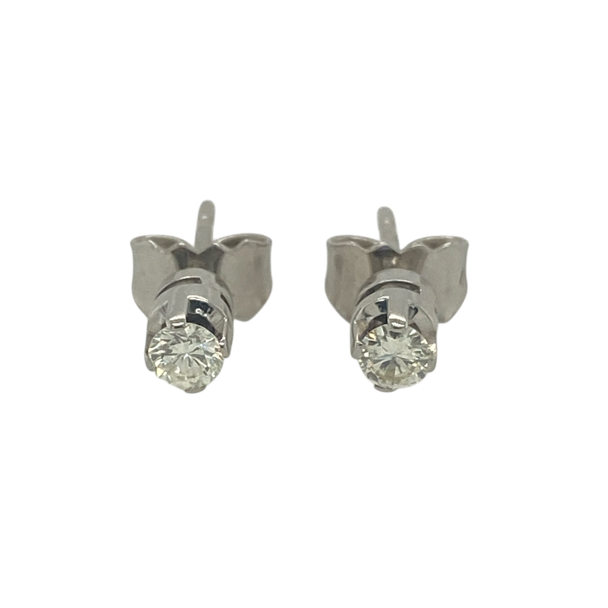 Add timeless sparkle and elegance to your jewellery collection with these pre-owned 18ct white gold diamond stud earrings, featuring classic brilliance in a refined and versatile design—perfect for everyday wear or special occasions.

Design: The earrings feature a classic diamond stud design, offering understated elegance with a focus on natural sparkle. Each earring is set with approximately 0.14 points of diamonds, totalling approximately 0.28 points for the pair.
