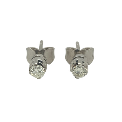 Add timeless sparkle and elegance to your jewellery collection with these pre-owned 18ct white gold diamond stud earrings, featuring classic brilliance in a refined and versatile design—perfect for everyday wear or special occasions.

Design: The earrings feature a classic diamond stud design, offering understated elegance with a focus on natural sparkle. Each earring is set with approximately 0.14 points of diamonds, totalling approximately 0.28 points for the pair.
