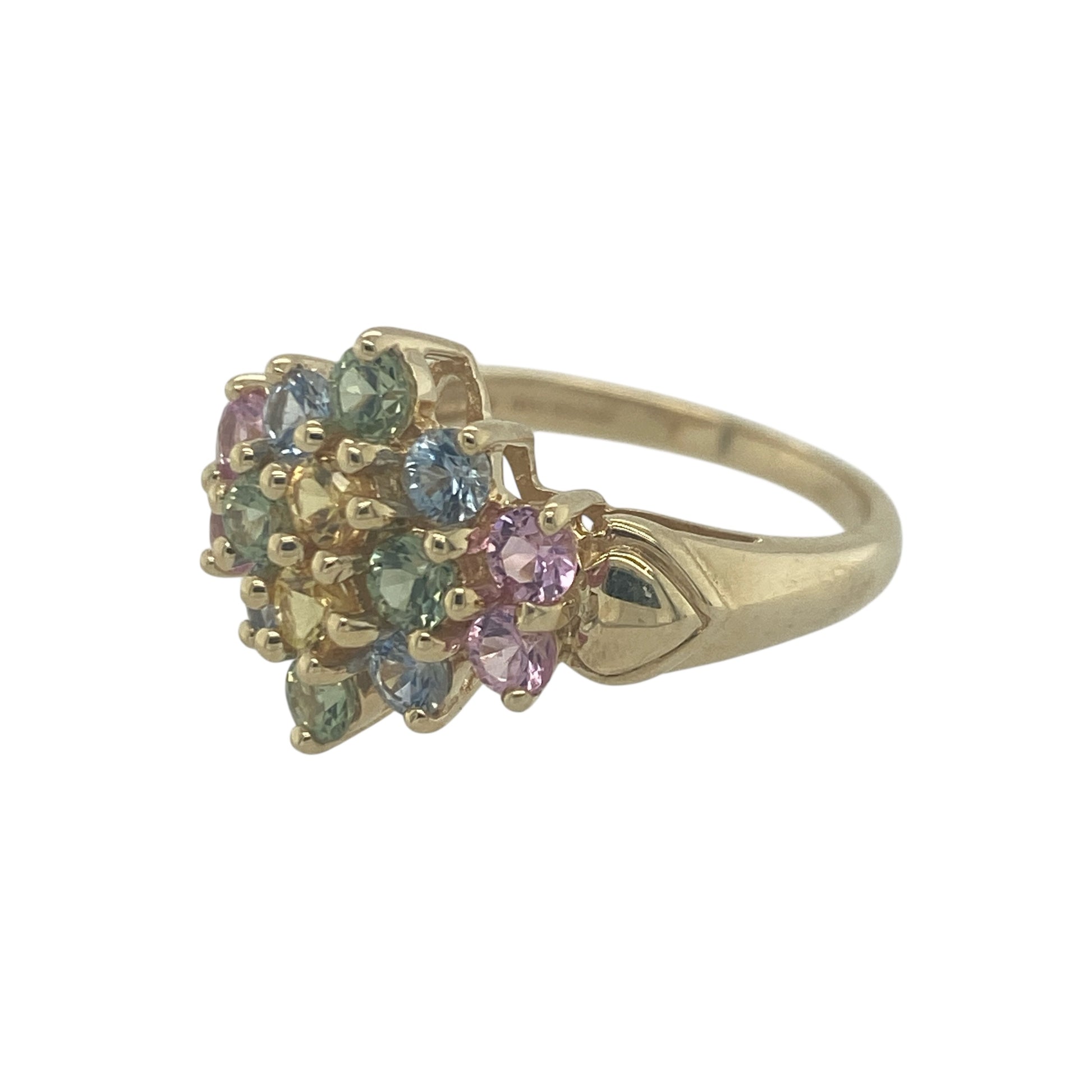 Add vibrant colour and playful elegance to your jewellery collection with this pre-owned 9ct yellow gold multi coloured topaz flower cluster ring, featuring a bright floral design with eye-catching sparkle—perfect for everyday wear or as a standout statement piece.

Design: The ring showcases a flower cluster arrangement set with multi coloured topaz gemstones, each measuring approximately 2mm. 