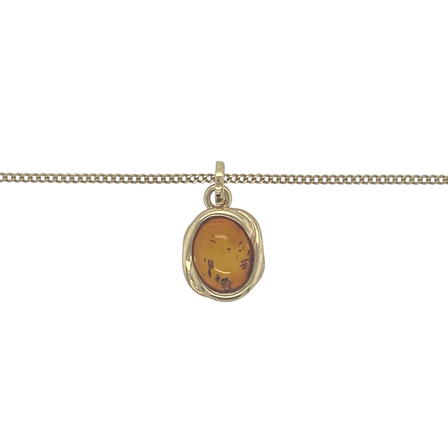 Add warm tones and natural beauty to your jewellery collection with this pre-owned 9ct yellow gold amber necklace, featuring a rich golden gemstone with timeless appeal—perfect for everyday wear or special occasions.

Design: The necklace features an amber gemstone measuring approximately 9mm by 7mm, offering a smooth and eye-catching focal point. The simple design allows the natural colour and character of the amber to stand out.
