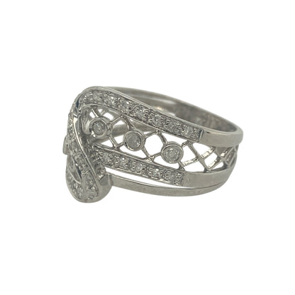 Add contemporary elegance and subtle sparkle to your jewellery collection with this pre-owned 9ct white gold diamond double band twist ring, featuring a stylish layered design—perfect for everyday wear or special occasions.

Design: The ring features a double band twist design, creating a layered and flowing look across the finger. Diamonds are incorporated into the design, adding delicate sparkle and enhancing the modern aesthetic.
