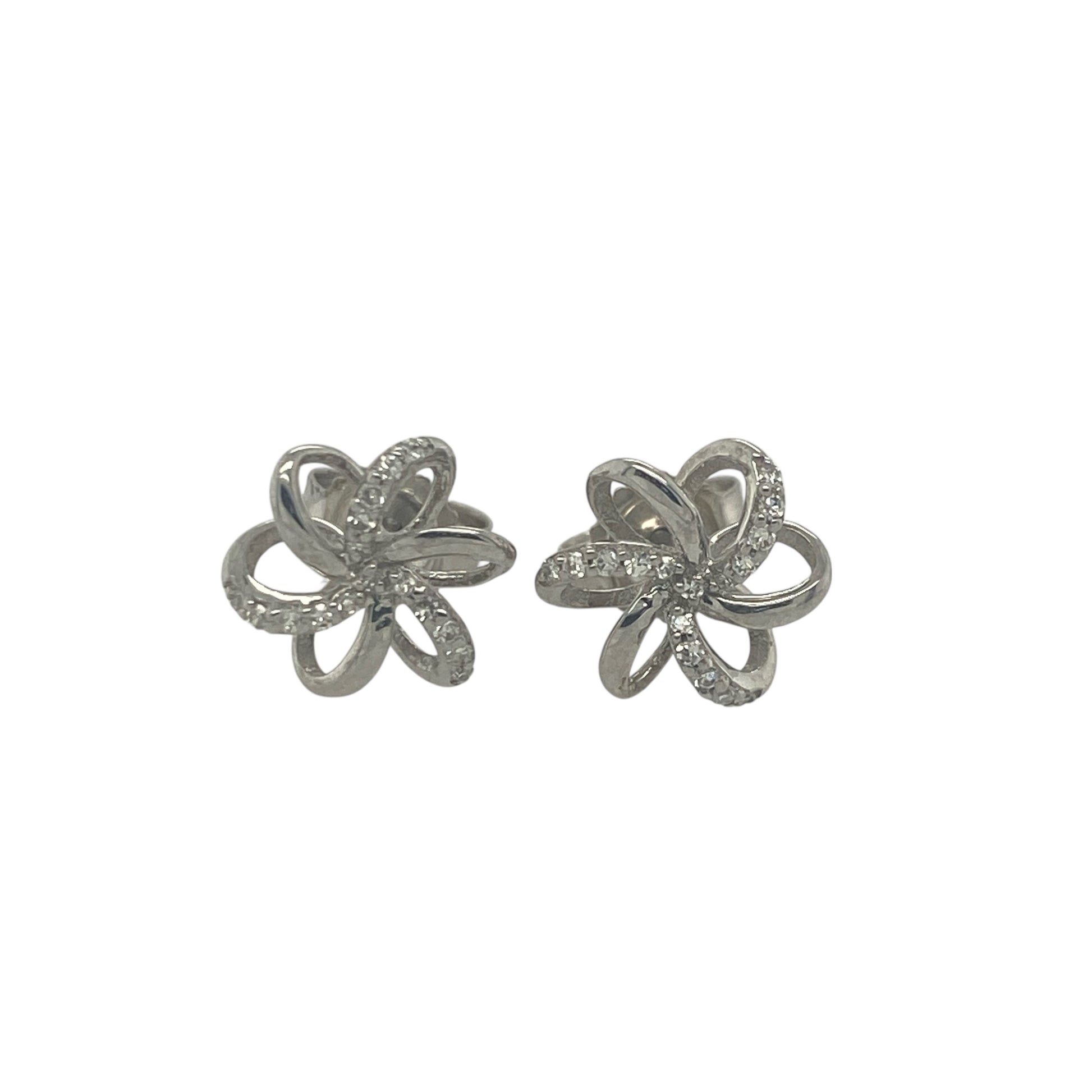 Add delicate sparkle and timeless charm to your jewellery collection with these pre-owned 9ct white gold diamond flower stud earrings, featuring a classic floral design—perfect for everyday wear or special occasions.

Design: The earrings showcase a pretty flower motif set with sparkling diamonds, forming a balanced and elegant shape. The front of each earring measures approximately 8mm, offering a noticeable yet refined presence.
