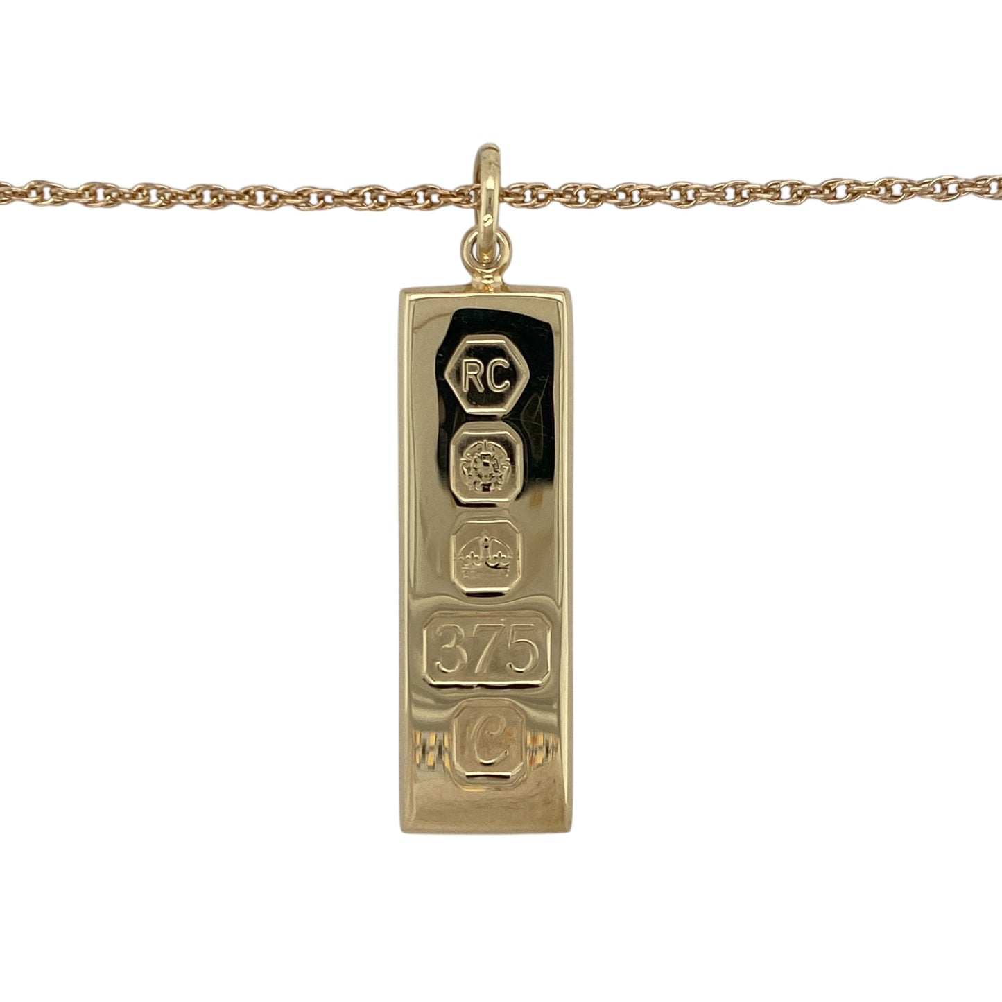 Make a bold and timeless statement with this pre-owned 9ct yellow gold solid ingot pendant on a 24" Prince of Wales chain necklace, combining classic design with substantial presence—perfect for everyday wear or standout styling.

Design: The necklace features a traditional solid gold ingot pendant suspended from a Prince of Wales chain, creating a strong and iconic look.
Material: Made from 9-carat yellow gold, both the pendant and chain have a polished finish that enhances their rich, warm tone.