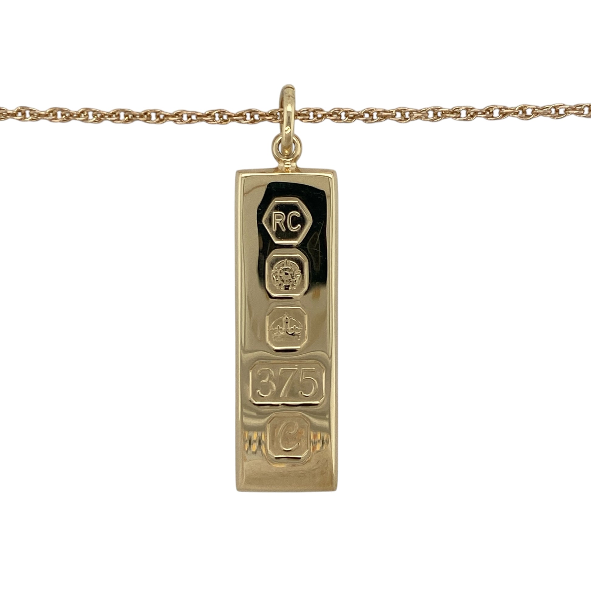 Make a bold and timeless statement with this pre-owned 9ct yellow gold solid ingot pendant on a 24" Prince of Wales chain necklace, combining classic design with substantial presence—perfect for everyday wear or standout styling.

Design: The necklace features a traditional solid gold ingot pendant suspended from a Prince of Wales chain, creating a strong and iconic look.
Material: Made from 9-carat yellow gold, both the pendant and chain have a polished finish that enhances their rich, warm tone.