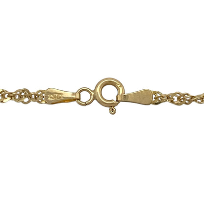 Add a refined and elegant touch to your jewellery collection with this pre-owned 9ct yellow gold 22" Singapore chain, offering graceful movement and subtle shine—perfect for everyday wear or layering.

Design: The chain features a classic Singapore link design, with twisted and faceted links that create a flowing, shimmering effect as it moves.
Material: Made from 9-carat yellow gold, it has a polished finish that enhances its warm tone and reflective quality.