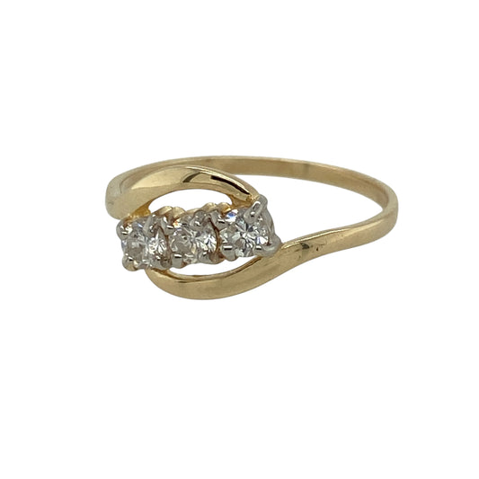 Add a touch of sparkle and modern elegance to your jewellery collection with this pre-owned 9ct yellow gold cubic zirconia set trilogy twist ring, combining classic styling with a contemporary finish—perfect for everyday wear or special occasions.

Design: The ring features a stylish trilogy design with a flowing twist band, creating movement and a graceful, eye-catching look across the finger.