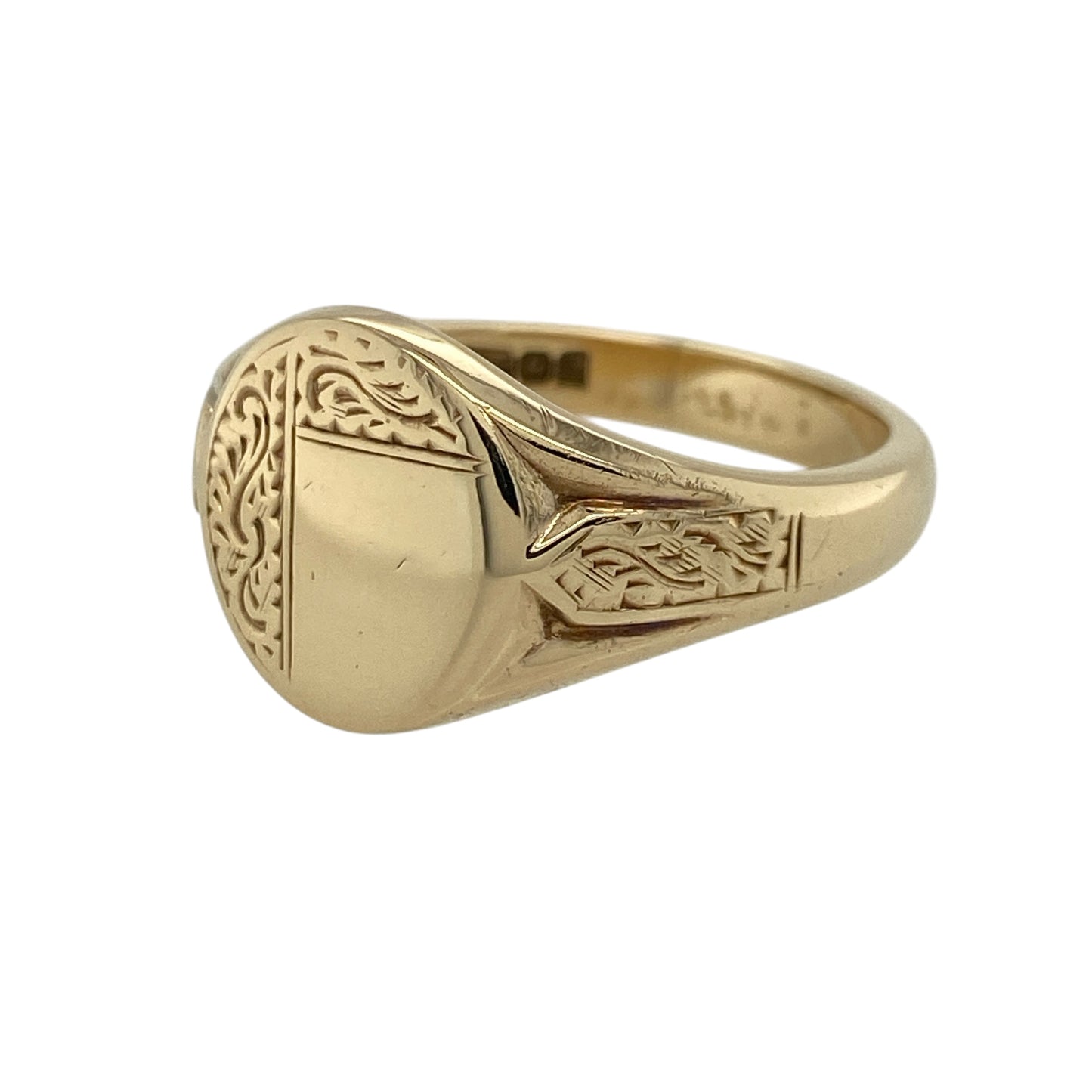 Add a bold and classic piece to your jewellery collection with this pre-owned 9ct yellow gold patterned oval signet ring, combining traditional style with eye-catching detail—perfect for everyday wear or making a statement.

Design: The ring features a large oval signet face with an engraved patterned finish, creating a distinctive and textured appearance.
Material: Made from 9-carat yellow gold, it has a polished and patterned surface that enhances its warm tone and classic appeal.