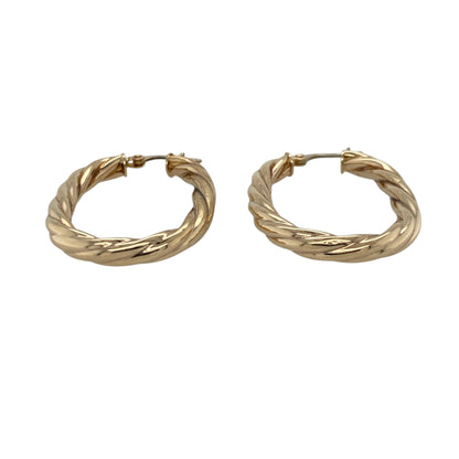 Add a stylish and elegant touch to your jewellery collection with these pre-owned 9ct yellow gold twisted oval creole earrings, combining classic shape with a modern twist—perfect for everyday wear or special occasions.

Design: The earrings feature an oval creole shape with a twisted design, creating a flowing and eye-catching look that reflects light beautifully.
Material: Made from 9-carat yellow gold, they have a polished finish that enhances their warm tone and highlights the detailed twist.