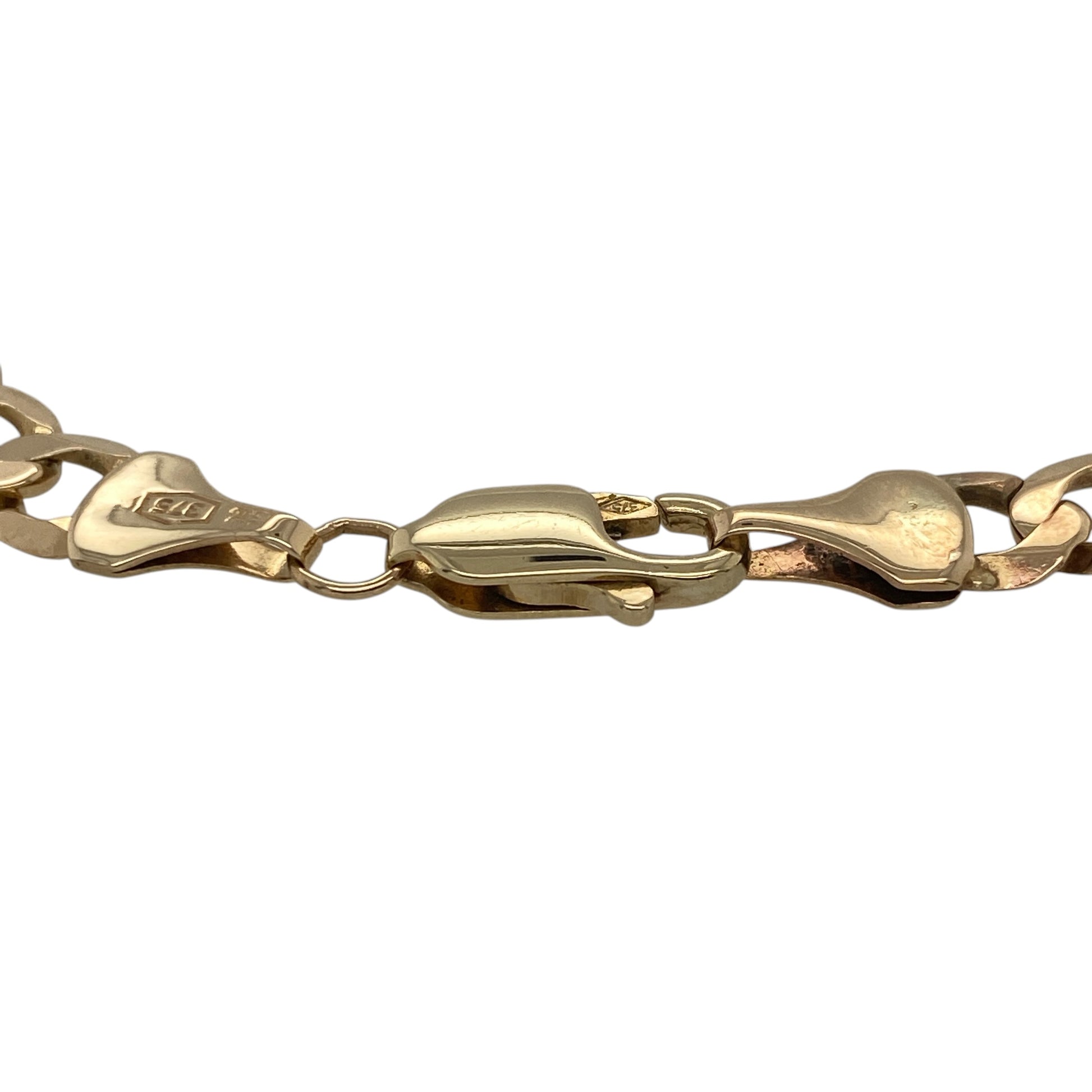 Add a bold and timeless piece to your jewellery collection with this pre-owned 9ct yellow gold 7" curb bracelet, combining classic design with a strong and stylish presence—perfect for everyday wear or standout styling.

Design: The bracelet features a traditional curb link design, with smooth, interlocking links that create a clean and enduring look.
Material: Made from 9-carat yellow gold, it has a polished finish that enhances its warm tone and classic appeal.
