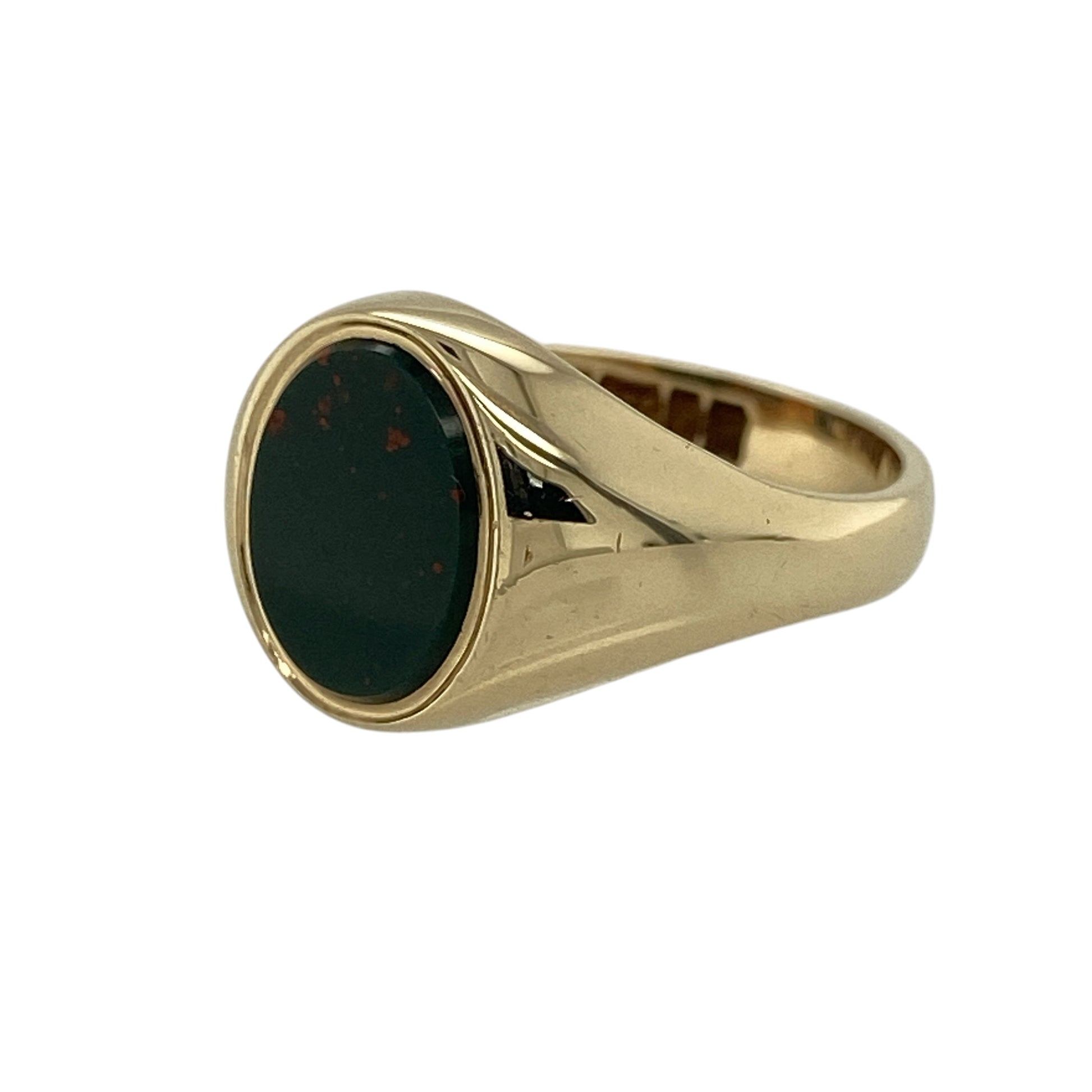 Add a bold and classic piece to your jewellery collection with this pre-owned 9ct yellow gold bloodstone set oval signet ring, combining traditional style with rich natural character—perfect for everyday wear or making a statement.

Design: The ring features a traditional oval signet design, set with a striking bloodstone displaying its deep green tones with natural red flecks.