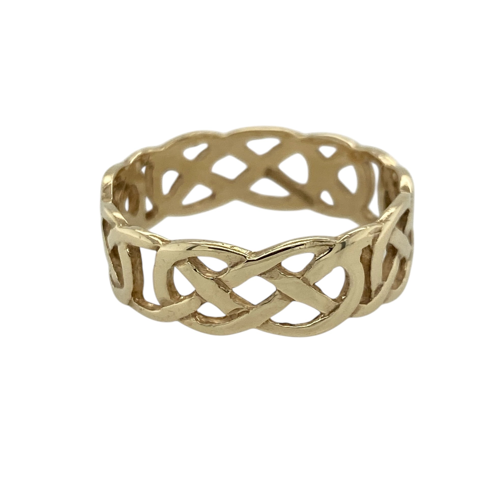 Add a meaningful and stylish piece to your jewellery collection with this pre-owned 9ct yellow gold open Celtic knot band ring, combining traditional symbolism with a bold design—perfect for everyday wear or making a statement.

Design: The ring features an open Celtic knot design across the band, symbolising eternity and connection, with an intricate and eye-catching pattern.
Material: Made from 9-carat yellow gold, it has a polished finish that enhances its warm tone and highlights the detailed knotwork.